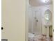 Bathroom with pedestal sink, glass-enclosed shower, patterned tile floor at 1527 Patricia Dr, Morrow, GA 30260