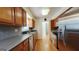 Kitchen featuring stainless steel appliances, generous counter space, and hardwood floors at 1527 Patricia Dr, Morrow, GA 30260