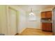 Bright kitchenette area with wooden cabinets and natural light at 1527 Patricia Dr, Morrow, GA 30260