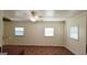 Bright living room with decorative floors, neutral walls, and multiple windows that provide plenty of natural light at 1527 Patricia Dr, Morrow, GA 30260