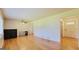 Open concept living room with hardwood floors and lots of natural light at 1527 Patricia Dr, Morrow, GA 30260