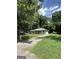 Charming single-story home nestled among lush trees with a long driveway at 1597 Joseph E Boone Nw Blvd, Atlanta, GA 30314