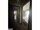 Hallway offers glimpses into sunlit rooms, presenting renovation potential with ample space at 1597 Joseph E Boone Nw Blvd, Atlanta, GA 30314