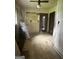 Incomplete kitchen with tile details on the walls and ceiling fan at 1597 Joseph E Boone Nw Blvd, Atlanta, GA 30314