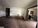 Spacious living room featuring original hardwood floors with potential for modern upgrades at 1597 Joseph E Boone Nw Blvd, Atlanta, GA 30314