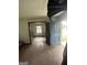 Living room with the front door open, looking into the kitchen and hallway at 1597 Joseph E Boone Nw Blvd, Atlanta, GA 30314