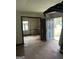 Renovator's opportunity with this expansive living room showing great natural light potential at 1597 Joseph E Boone Nw Blvd, Atlanta, GA 30314