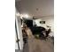 Spacious bedroom with a large bed, ceiling fan, and a well-lit sitting area at 3523 Lehigh Way, Decatur, GA 30034
