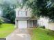 Charming two-story home with a single-car garage and well-maintained front yard at 3523 Lehigh Way, Decatur, GA 30034