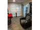 Recreation area with a pool table, comfortable seating, and sliding glass doors for natural light at 3523 Lehigh Way, Decatur, GA 30034