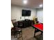Game room setup with karaoke equipment, a pool table, and a classic arcade game at 3523 Lehigh Way, Decatur, GA 30034