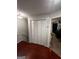 Hallway featuring hardwood floors, closet and view into bedroom at 3523 Lehigh Way, Decatur, GA 30034