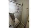 Modern tiled shower with shelving for toiletries and neutral color scheme at 3523 Lehigh Way, Decatur, GA 30034