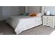 Cozy bedroom with a large bed and decorative nightstands at 11096 Cornerstone Way, Hampton, GA 30228