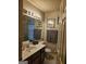 Bathroom with a vanity and mirror, complemented by neutral-colored walls and fixtures at 620 Ashton Ln, Lawrenceville, GA 30044