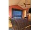Bedroom featuring vaulted ceilings, a ceiling fan, and a large window with dark curtains at 620 Ashton Ln, Lawrenceville, GA 30044