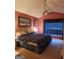 Bedroom featuring vaulted ceilings, a ceiling fan, and a large window with dark curtains at 620 Ashton Ln, Lawrenceville, GA 30044