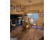 Bright dining room featuring glass table and chandelier lighting at 620 Ashton Ln, Lawrenceville, GA 30044