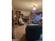 Cozy living room with fireplace and built in shelving at 620 Ashton Ln, Lawrenceville, GA 30044