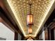 Unique brick ceiling with recessed lighting highlighting decorative pendant lights in the corridor at 4874 Kettle River Pt, Suwanee, GA 30024