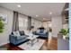 Bright living room featuring hardwood floors, recessed lighting, and stylish contemporary furniture at 130 Mount Zion Sw Rd, Atlanta, GA 30354