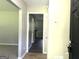 Inviting entryway with neutral walls and flooring, offering a glimpse into the home's interior at 3589 Burlingham Dr, Lithonia, GA 30038
