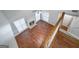 Inviting living room with fireplace, ceiling fan, and hardwood floors from a bird's eye view at 320 Cloverwood Drive, Fayetteville, GA 30215