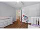 Bright room featuring wood floors, neutral walls, and plenty of space at 315 Antioch Road, Mcdonough, GA 30252