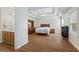 Large primary bedroom with wood-look flooring and en-suite bathroom at 315 Antioch Road, Mcdonough, GA 30252