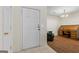 Welcoming entryway featuring tile floors, adjacent to an office area with a wooden roll top desk at 315 Antioch Road, Mcdonough, GA 30252