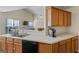 Well-lit kitchen featuring stainless steel appliances and a view to the living room at 315 Antioch Road, Mcdonough, GA 30252