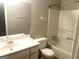 Bathroom featuring white sink, toilet, bathtub, and shower at 4263 Southvale Dr, Decatur, GA 30034