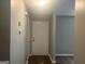 Neutral painted entryway with hardwood floors and a white front door at 4263 Southvale Dr, Decatur, GA 30034