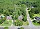 A high angle view outlining the property line in a lush neighborhood at 100 Castlebrook Chase, Tyrone, GA 30290