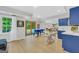 Bright open basement with white trim, blue cabinets, and a dining area at 100 Castlebrook Chase, Tyrone, GA 30290
