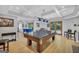 Expansive basement featuring a pool table, foosball table, and plenty of room for entertainment at 100 Castlebrook Chase, Tyrone, GA 30290