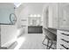 Modern primary bathroom with double vanity, free-standing tub, and frameless shower at 100 Castlebrook Chase, Tyrone, GA 30290