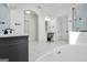Modern primary bathroom with free-standing tub, frameless shower, and double vanity at 100 Castlebrook Chase, Tyrone, GA 30290