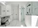 Bathroom view of white vanity, glass shower, marble flooring, and white walls at 100 Castlebrook Chase, Tyrone, GA 30290