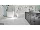 Modern bathroom featuring a free-standing tub, frameless shower, and double vanity at 100 Castlebrook Chase, Tyrone, GA 30290