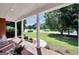 This home features a large front porch with views of the front yard, and provides great curb appeal at 100 Castlebrook Chase, Tyrone, GA 30290