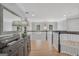 Open hallway with a printer on a console table and views to the living area at 100 Castlebrook Chase, Tyrone, GA 30290