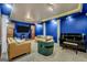 Enjoy Gathering time in this vibrant living room with a piano, built in cabinetry, and ample seating for guests at 100 Castlebrook Chase, Tyrone, GA 30290