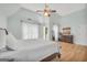 Spacious main bedroom with hardwood floors, tray ceiling and access to the deck at 100 Castlebrook Chase, Tyrone, GA 30290