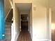 Hallway leading to stairs and other rooms with lovely flooring at 2561 Lancewood Ln, Lithonia, GA 30035