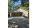 Large open garage space with concrete floors and neutral walls, offering ample storage and parking at 140 Dixie Ln, Covington, GA 30014