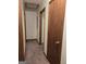 Hallway with doors leading to rooms at 140 Dixie Ln, Covington, GA 30014