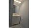 Bathroom featuring white sink with mirror and updated fixtures, providing a sleek and modern look at 993 Roosevelt Se Dr, Atlanta, GA 30354