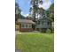 Charming house with a mix of brick and gray siding, complimented by a well-manicured lawn at 993 Roosevelt Se Dr, Atlanta, GA 30354
