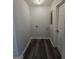A practical laundry room featuring hard surface flooring, neutral walls, and essential hookups at 993 Roosevelt Se Dr, Atlanta, GA 30354